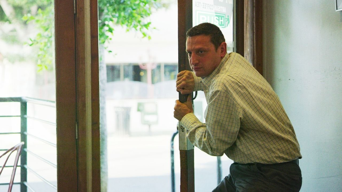 Tim Robinson struggles with a door in 'I Think You Should Leave'