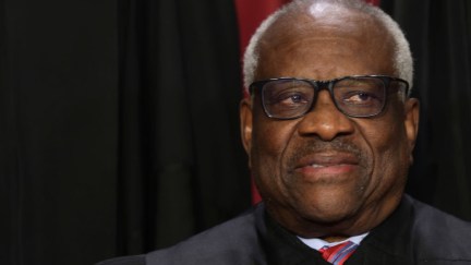 U.S. Supreme Court Justice Clarence Thomas, posing for his official portrait, looking somewhat uneasily off to the side.