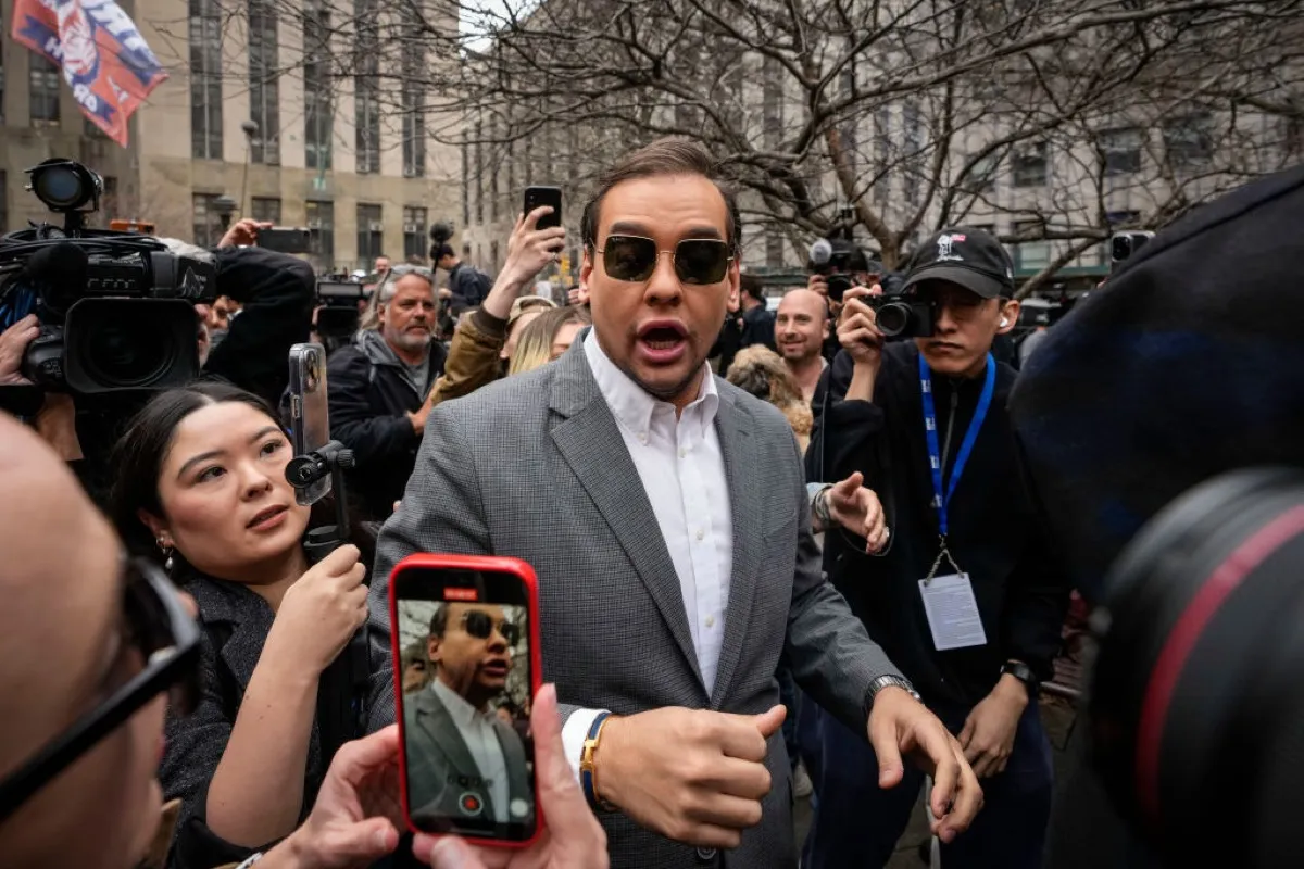 U.S. Rep. George Santos (R-NY) walks through the crowd gathered outside the courthouse where former U.S. President Donald Trump will arrive later in the day for his arraignment on April 4, 2023 in New York City.