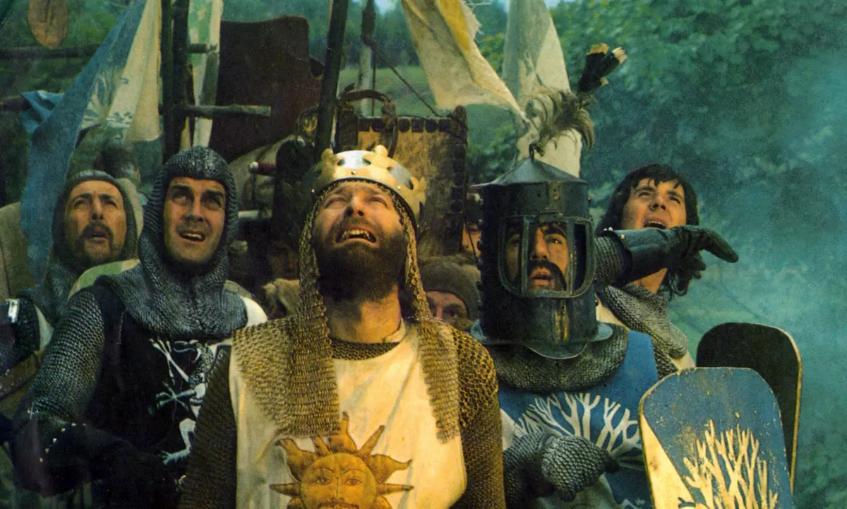 King Arthur and his knights look up in fear in "Monty Python and the Holy Grail"