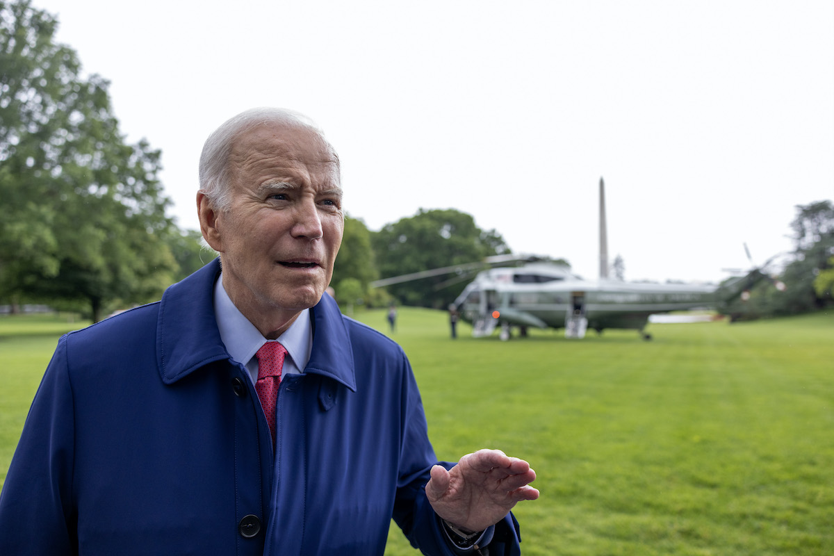 Joe Biden has an incredulous look while talking outdoors to the press.