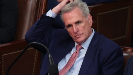 Kevin McCarthy scratches his head and stares blankly.