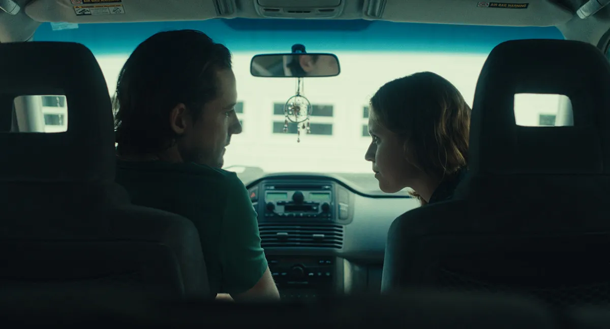 Lewis Pullman in a car with Eliza Scanlen in The Starling Girl