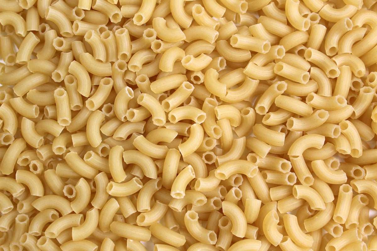 A mound of uncooked macaroni.