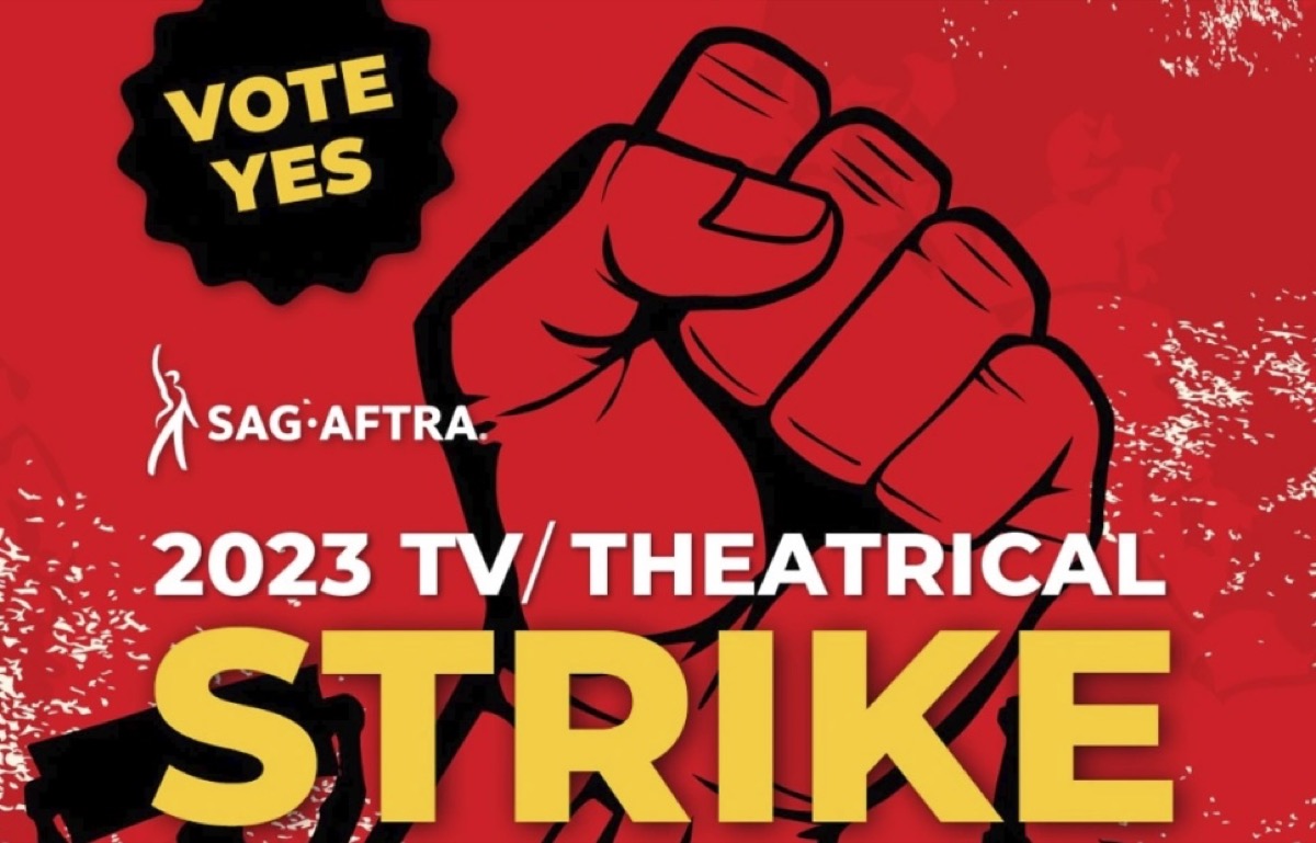 SAG-AFTRA strike authorization vote graphic of a clenched fist. It says "Vote yes. 2023 TV/Theatrical strike."