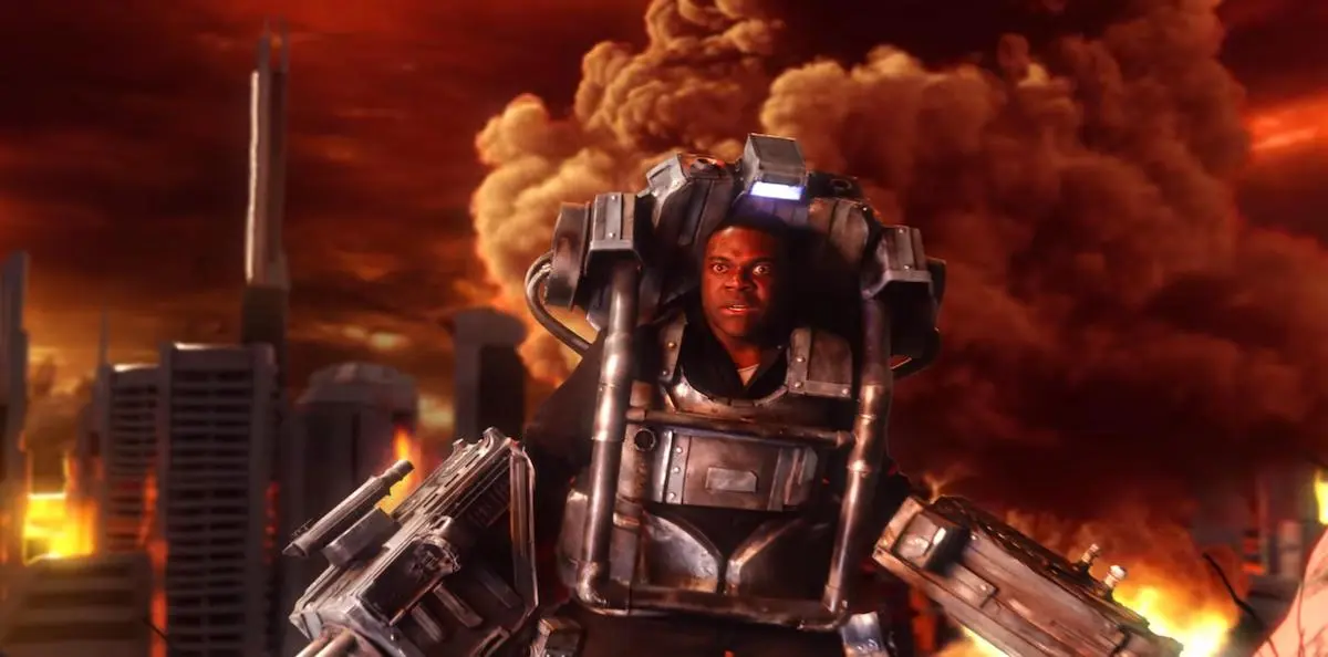 Sam Richardson wears robotic body armor against a red, smoky background in 'I Think You Should Leave' 
