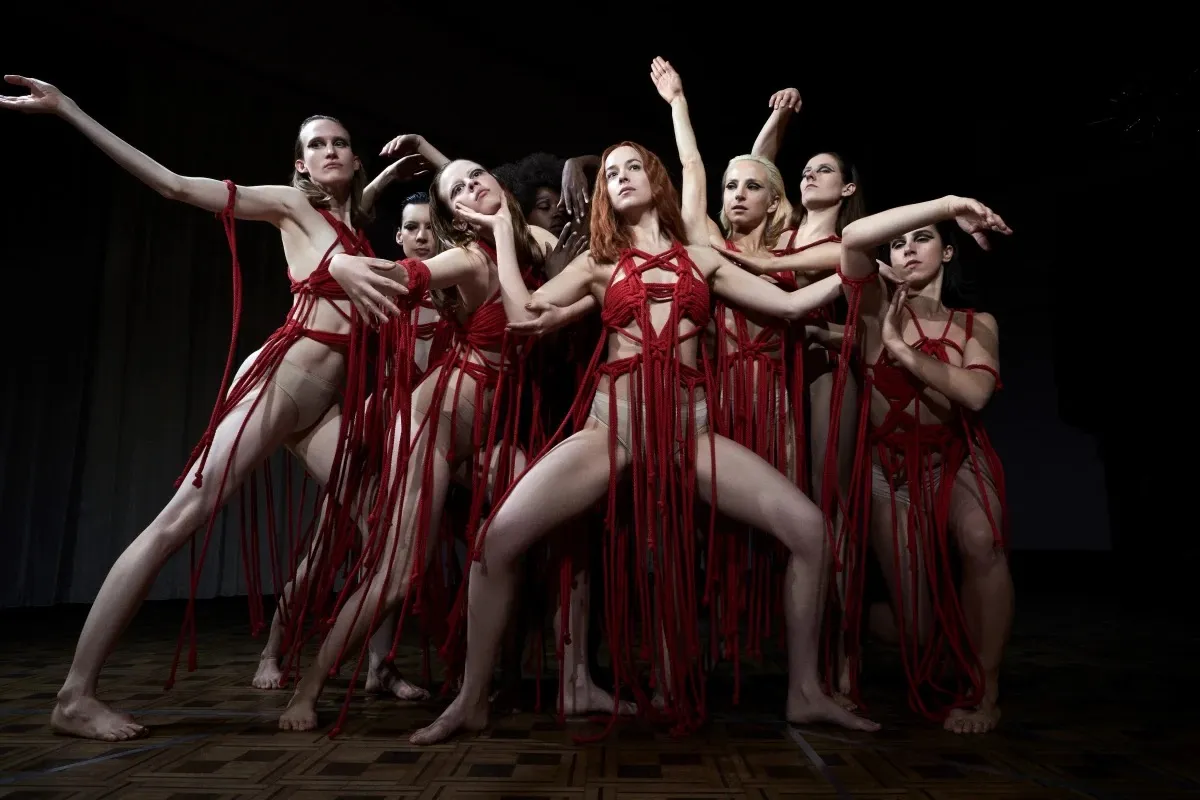 Dancers in costumes made of red rope, evocative of blood, in Luca Guadagnino's 'Suspiria'