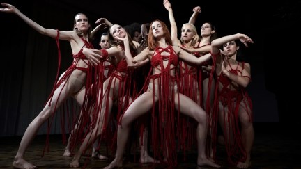 Dancers in costumes made of red rope, evocative of blood, in Luca Guadagnino's 'Suspiria'