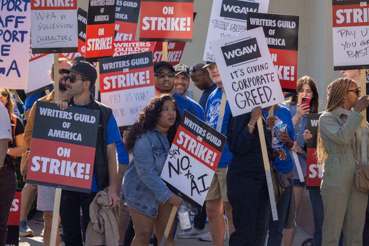 People picket in the WGA strike outside of Paramount Pictures.