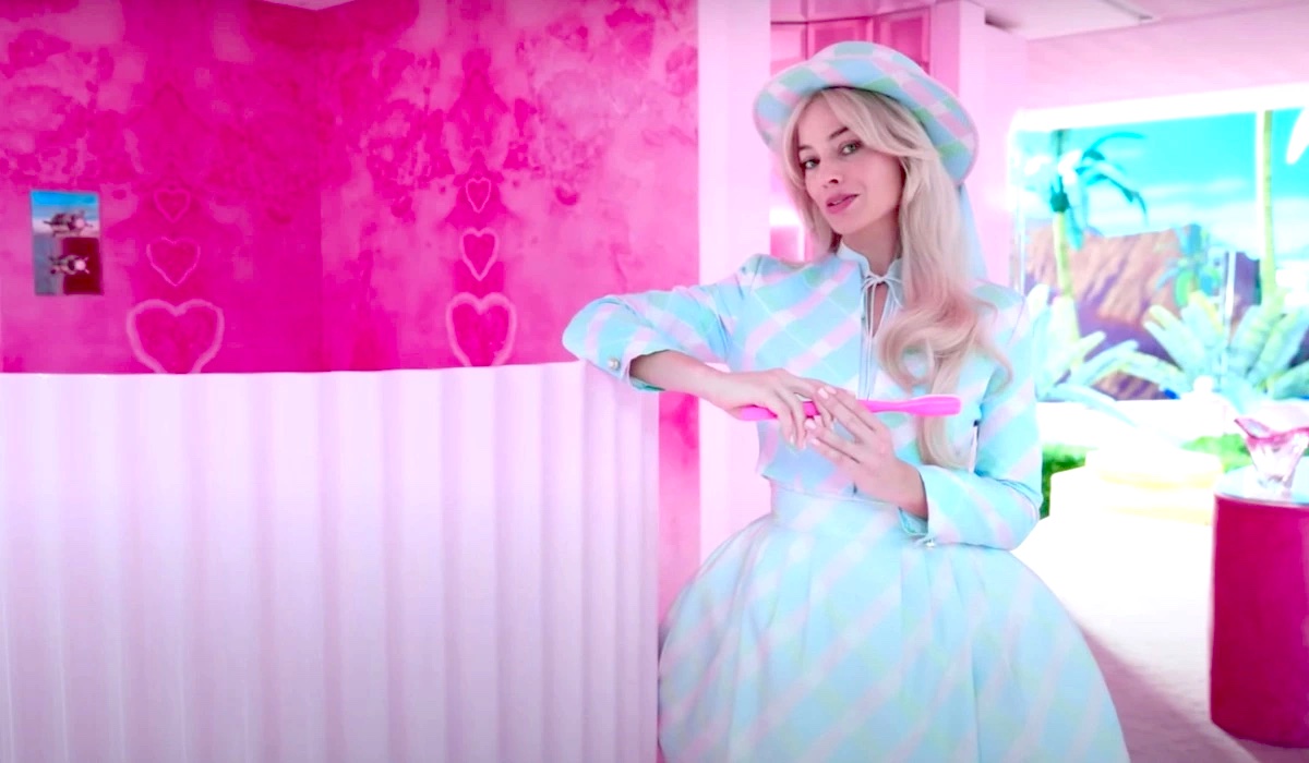 Margot Robbie as Barbie in the Barbie movie dream house tour.