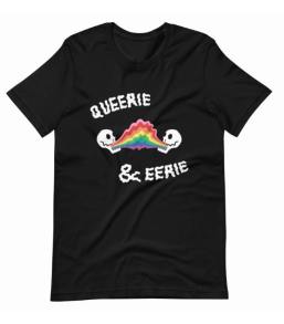 A black t-shirt with the text queerie & eerie in white. Between the two words are two skulls breathing rainbow fire at each other which meets in the middle.
