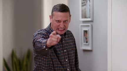 Tim Robinson pointing at the camera angrily in the 