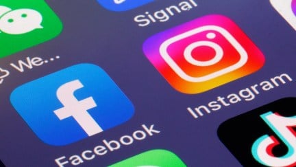 Instagram and Facebook app icons on a phone screen