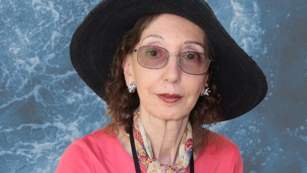 A photo of Joyce Carol Oates superimposed over a background of ocean waves