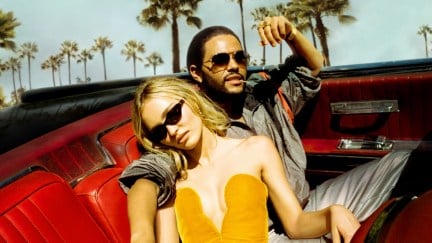 Jocelyn (Lily-Rose Depp) and Tedros (Abel Tesfaye) wear sunglasses and recline in a convertible in 'The Idol'