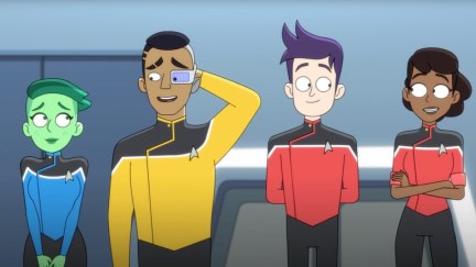 The cast of the animated Star Trek series, 'Lower Decks.' Tendi (Noël Wells), Rutherford (Eugene Cordero), Boimler (Jack Quaid), and Mariner (Tawny Newsome) stand in a row looking sheepishly at each other.