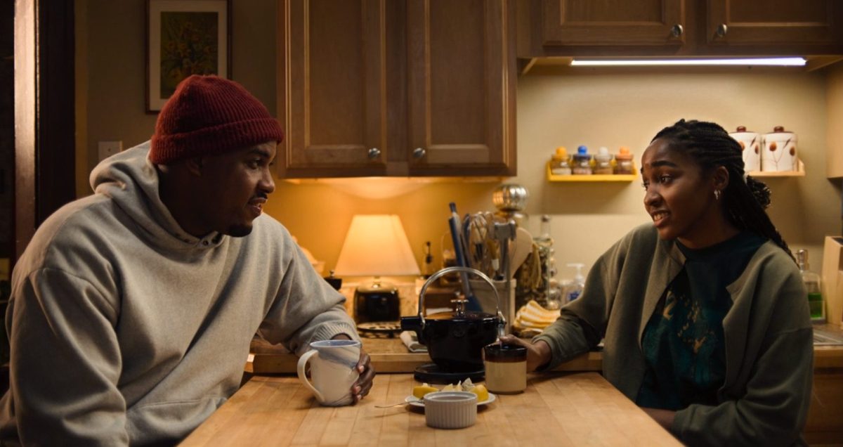 Marcus (Lionel Boyce) and Sydney (Ayo Edebiri) eating together in The Bear.