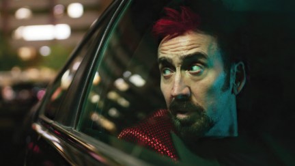 Nicolas Cage gazes out a car window at night in 'Sympathy for the Devil'