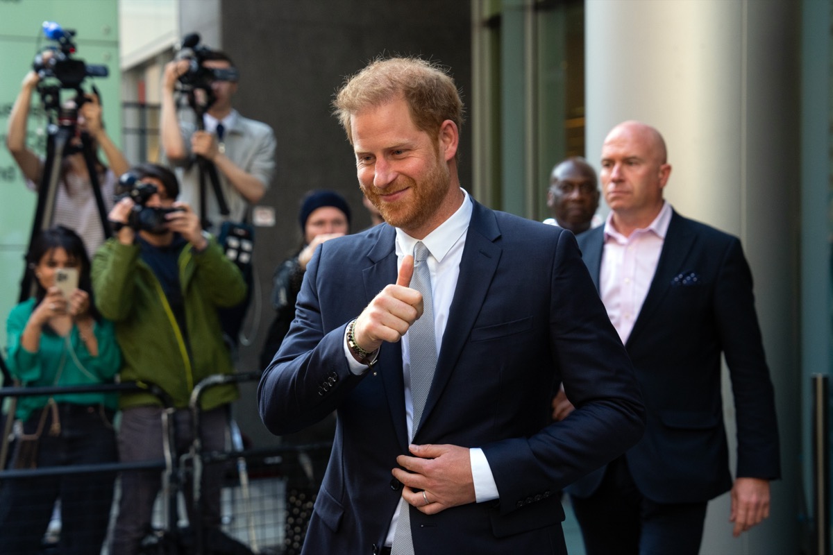 Prince Harry, Duke of Sussex, gives a thumbs up as he leaves after giving evidence at the Mirror Group Phone hacking trial at the Rolls Building at High Court on June 7, 2023 in London, England. 