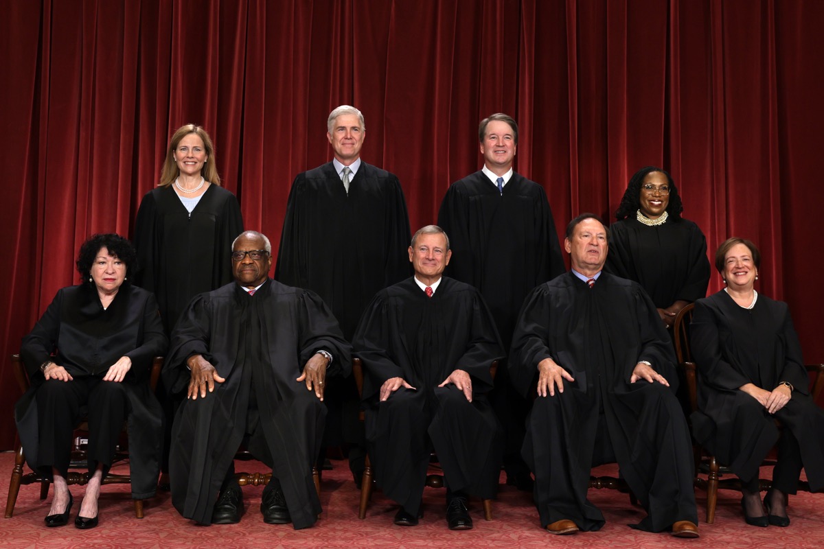 United States Supreme Court (front row L-R) Associate Justice Sonia Sotomayor, Associate Justice Clarence Thomas, Chief Justice of the United States John Roberts, Associate Justice Samuel Alito, and Associate Justice Elena Kagan, (back row L-R) Associate Justice Amy Coney Barrett, Associate Justice Neil Gorsuch, Associate Justice Brett Kavanaugh and Associate Justice Ketanji Brown Jackson pose for their official portrait at the East Conference Room of the Supreme Court building on October 7, 2022 in Washington, DC.