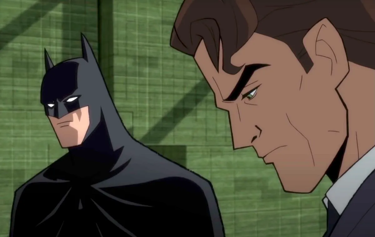 An animated Batman having a conversation with his head down in "Batman: The Long Halloween"