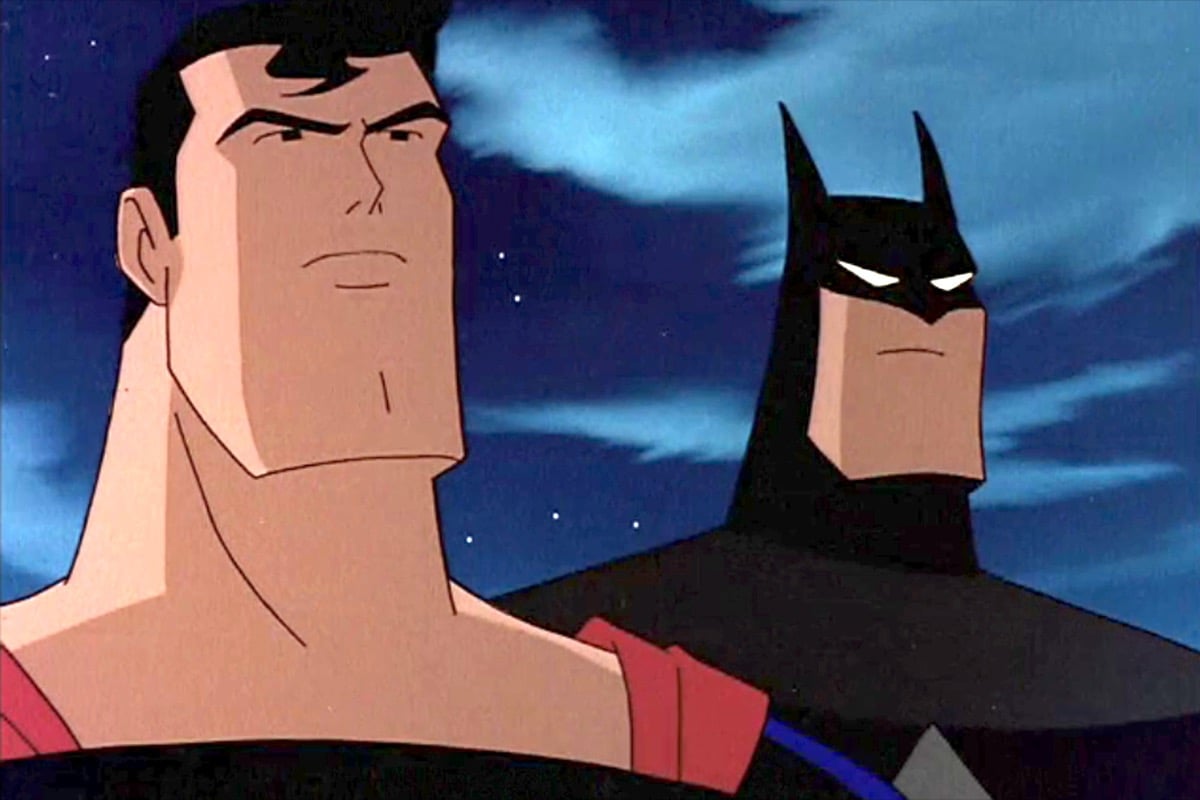 Animated Batman and Superman look out over the city.