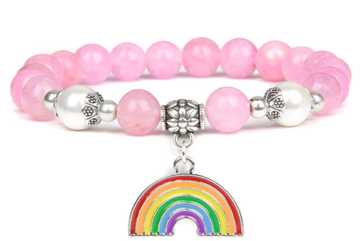 Rose Gold Beaded Rainbow Charm Bracelet; a pink beaded bracelet with some silver beads and an enamel rainbow charm.