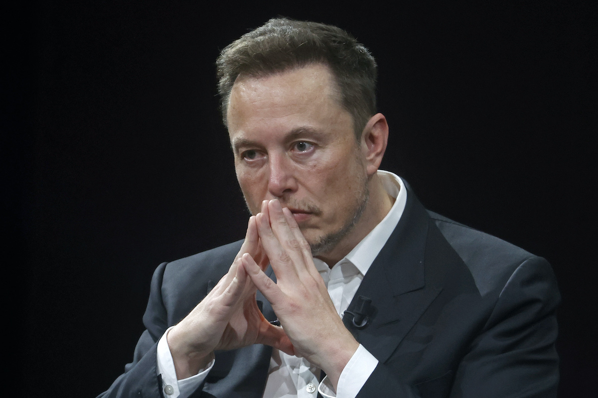 Elon Musk looks pensive.