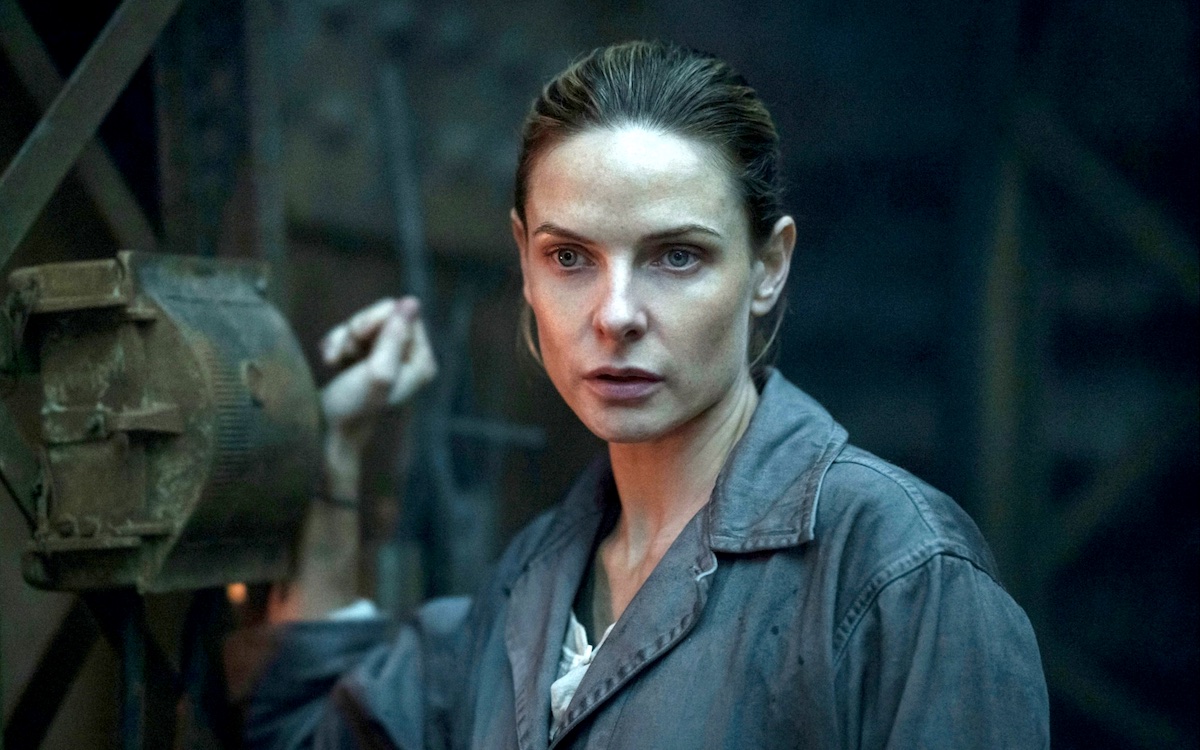 Rebecca Ferguson in the down deep as Juliette in Apple TV+'s 'Silo'