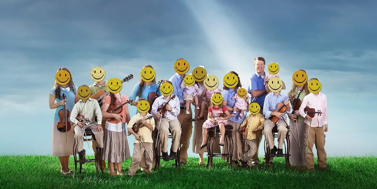 The Duggar family, consisting of about 20 people, stands on the grass with a ray of light touching their heads. They all have a yellow happy face over their real faces.