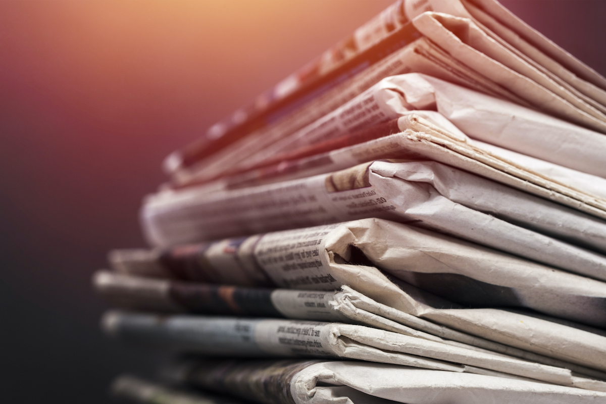 A stack of newspapers.