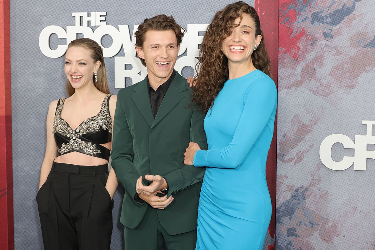 Emmy Rossum. Amanda Seyfried, and Tom holland at the premiere for hte Crowded room