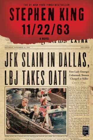 Cover of Stephen King's novel '11/22/63." The top of the cover is a red stripe with black letters that read "The #1 New York Times Bestseller Stephen King 11/22/63 a novel." Beneath that is a reprint of a newspaper clipping with the headline "JFK Slain in Dallas, LBJ Takes Oath"