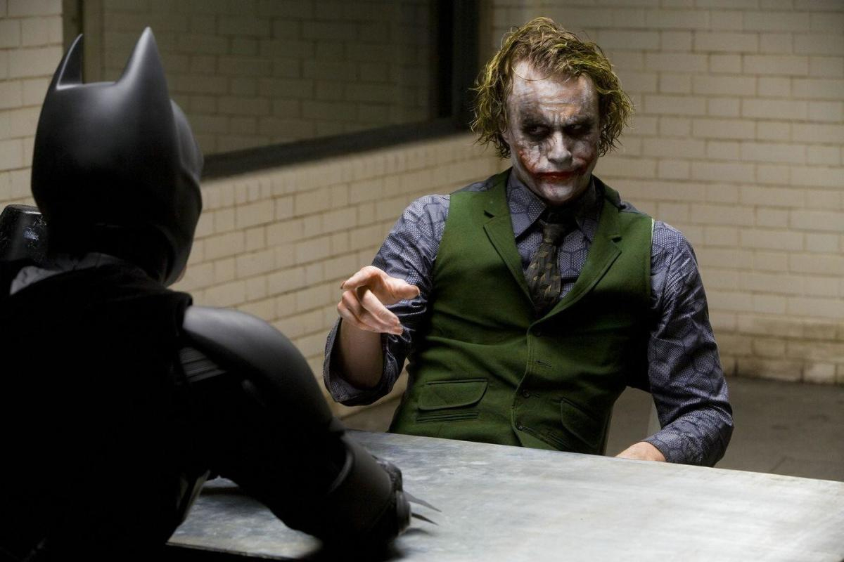 Batman (Christian Bale) interrogates the Joker (Heath Ledger) in 'The Dark Knight'