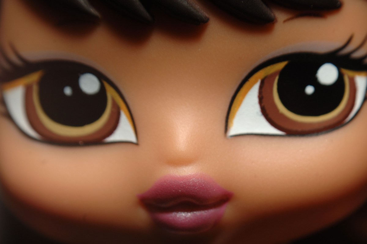 Closeup of a Bratz doll's face.