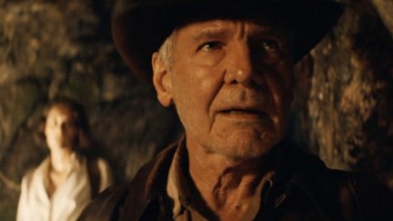 Harrison Ford in Indiana Jones and the Dial of Destiny, with Phoebe Waller-Bridge in the background