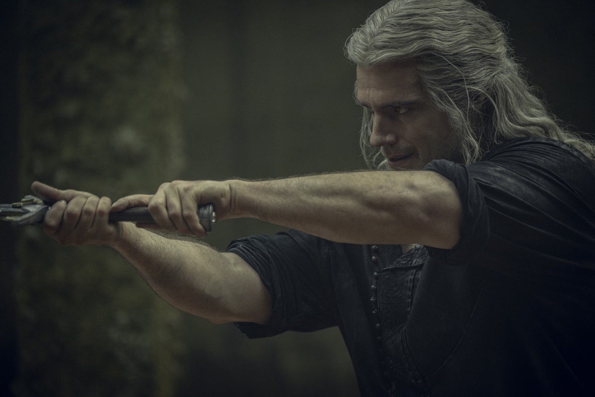 Henry Cavill as Geralt, wielding a sword in 'The Witcher' season 3
