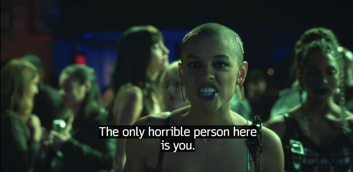 A screengrab shows Julien Calloway looking angry at a party in Gossip Girl. The closed captioning reads, "The only horrible person here is you."