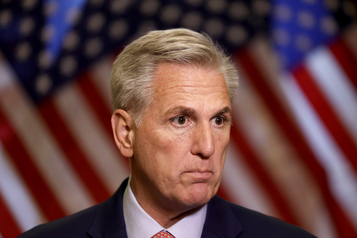 Kevin McCarthy stares blankly.