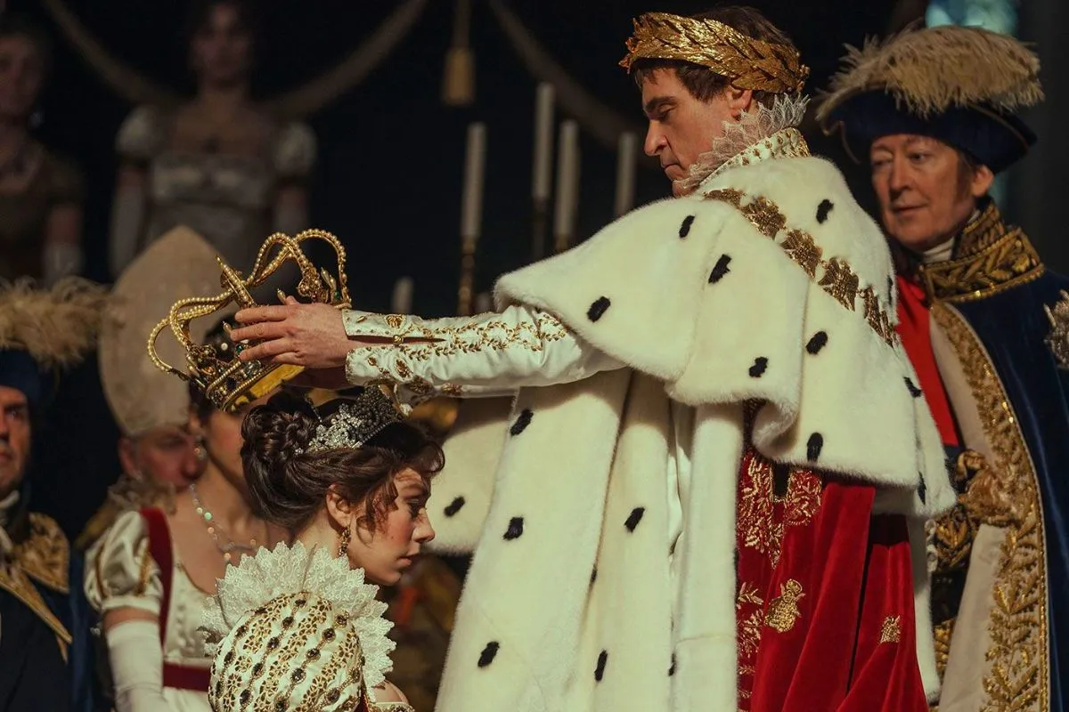 Napoleon Bonaparte (Joaquin Phoenix) crowning his empress Josephine (Vaness Kirby).