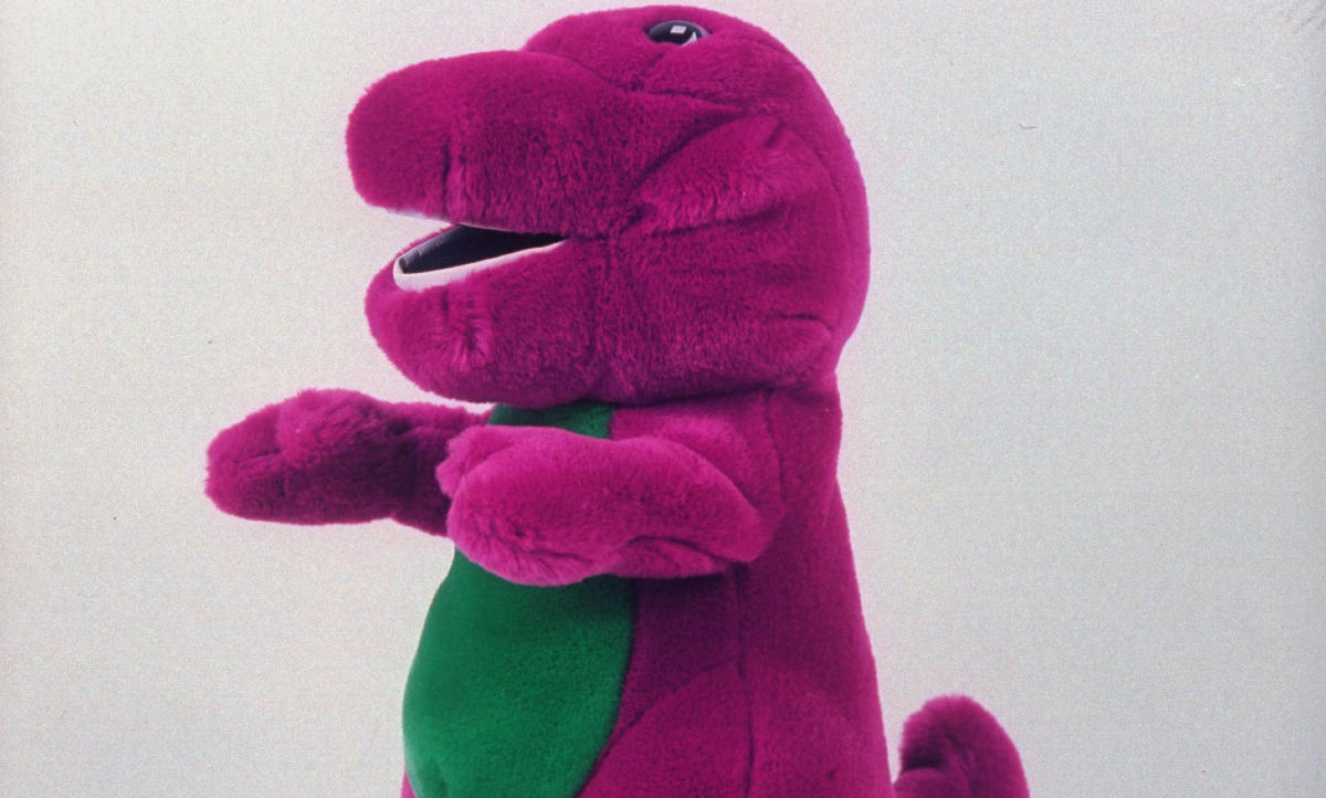 A plush Barney the dinosaur