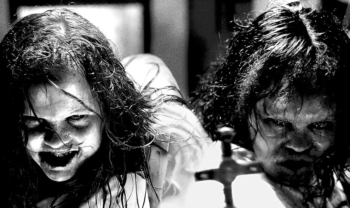 The poster for 'The Exorcist: Believer': A black-and-white image of two possessed girls