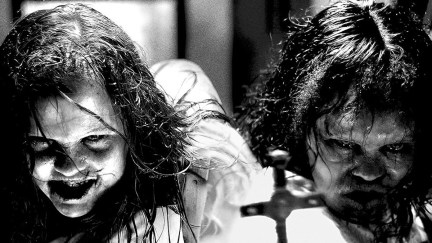 The poster for 'The Exorcist: Believer': A black-and-white image of two possessed girls