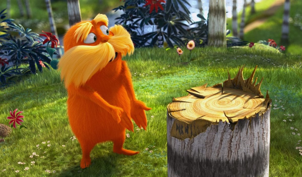 The Lorax gesturing angrily at a tree stump