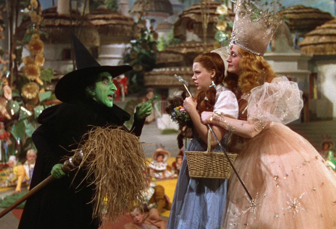 Margaret Hamilton as the Wicked Witch, Judy Garland as Dorothy, and Billie Burke as Glinda in The Wizard of Oz (Warner Bros.)