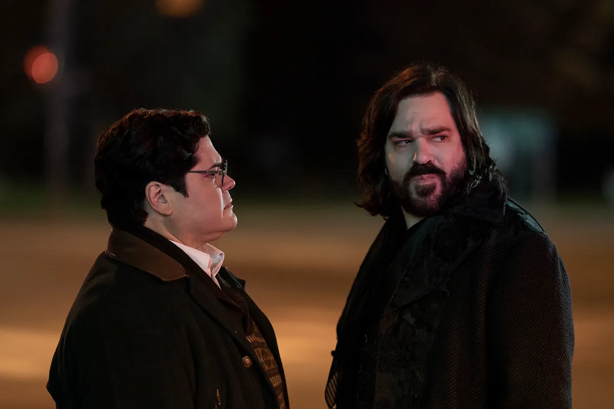 “WHAT WE DO IN THE SHADOWS” -- “A Night Out with the Guys” -- Season 5, Episode 2 (Airs July 13) — Pictured (L-R): Harvey Guillén as Guillermo, Matt Berry as Laszlo. CR: Russ Martin: FX