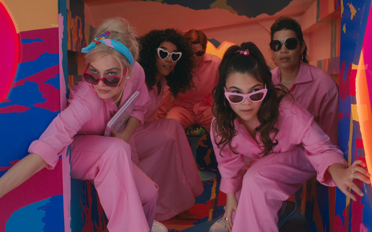 Barbie and her friends in pink jumpsuits in 'Barbie'