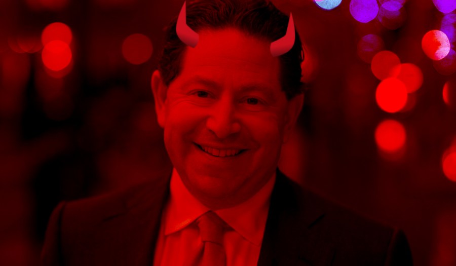 A photo of Bobby Kotick edited with a red tint and cartoonish devil horns on his head