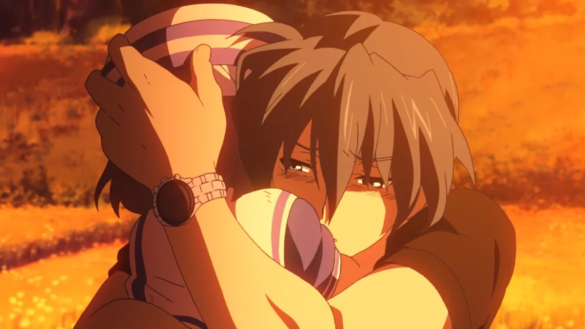 A man hugs a child at sunset in "Clannad: After Story" 