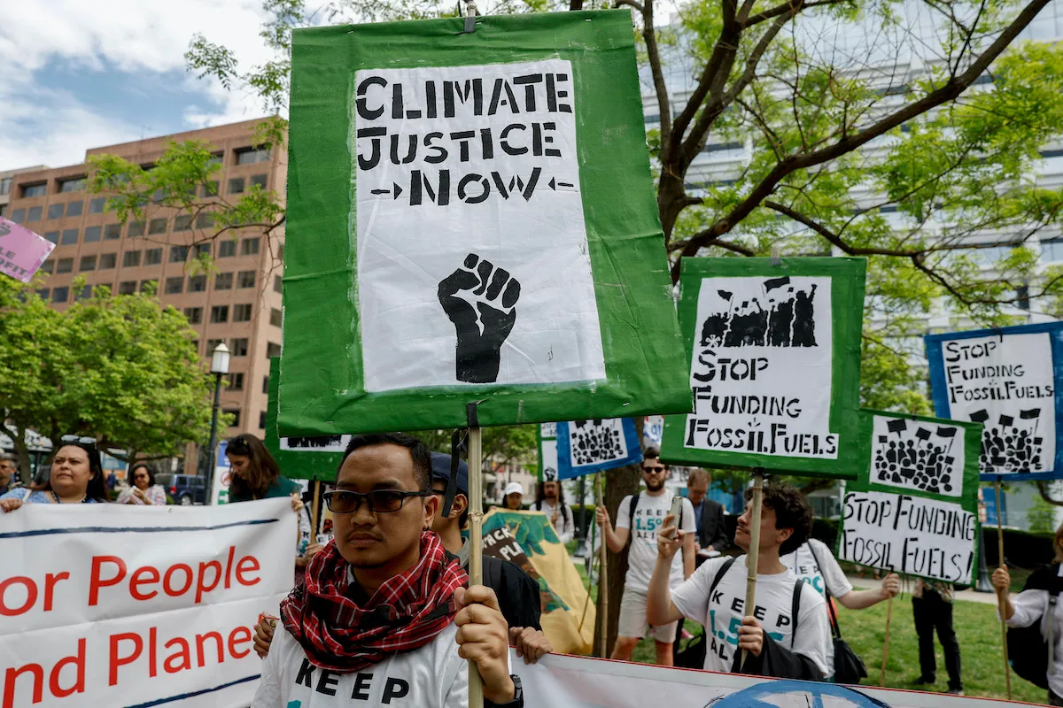 Climate activists march in protest.